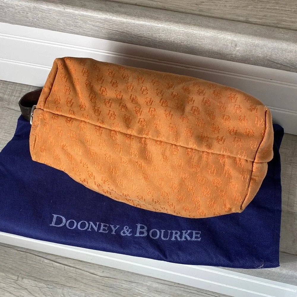 Dooney & Bourke Vintage burnt Orange over the shoulder bucket Bag